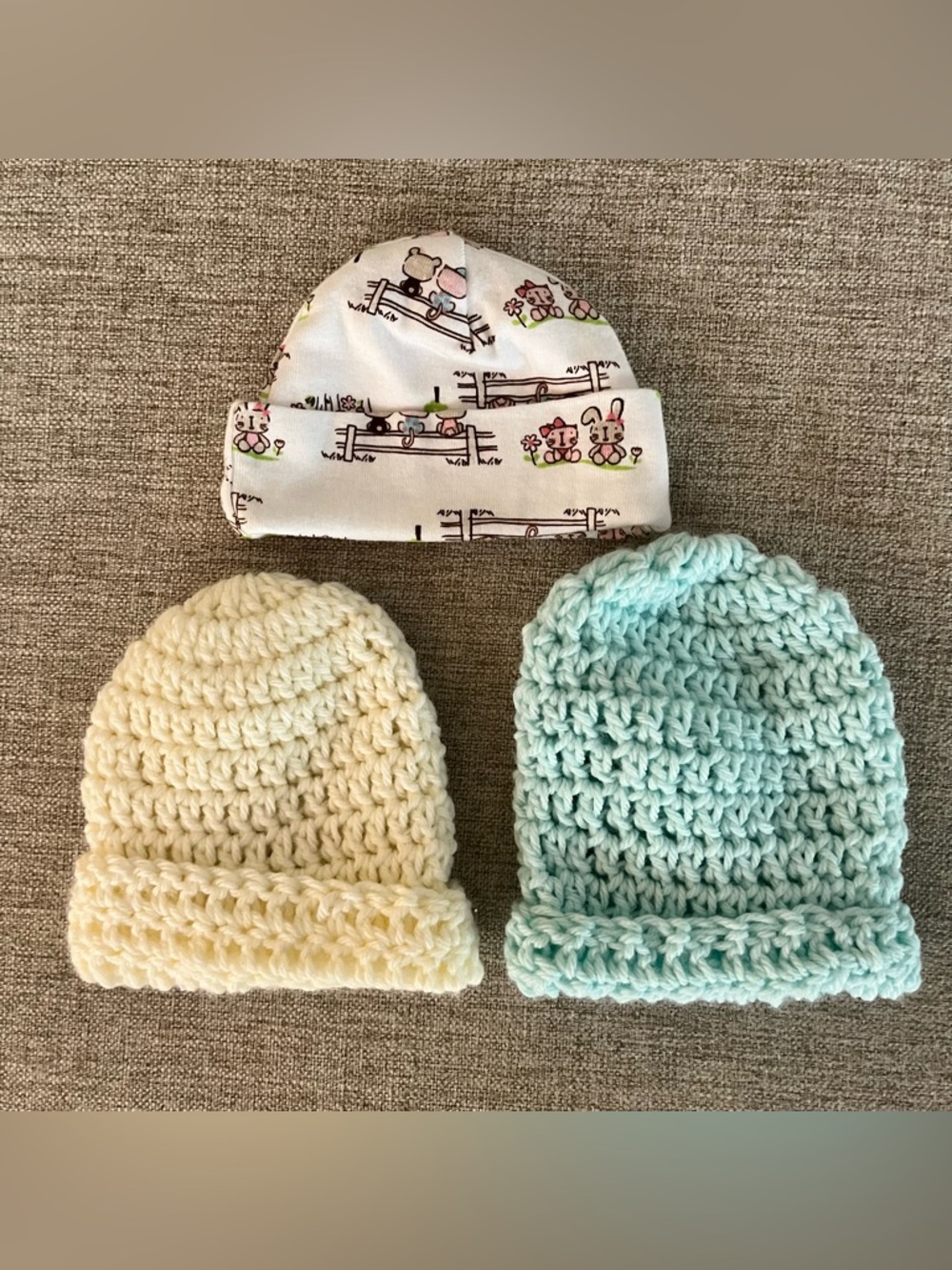Set of 3 infant caps. 2 are hand knit with love & the other is Gerber, all NEW.
